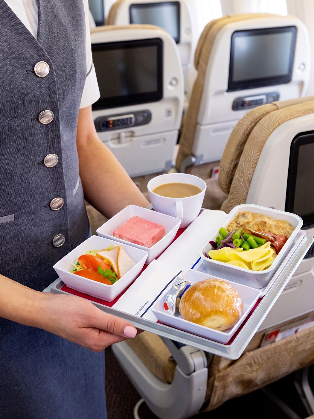 An in-flight meal tray in a cabin galley